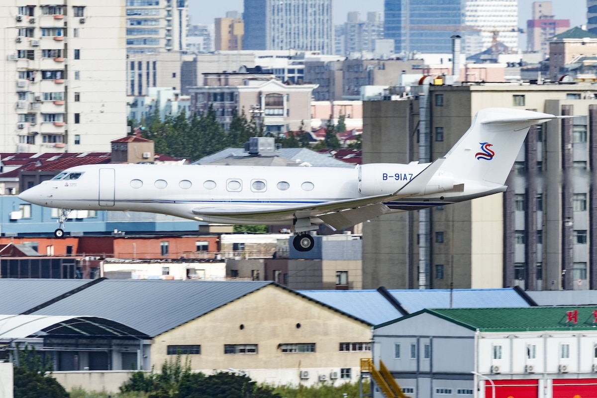 A G650 private jet soaring above Shanghai.