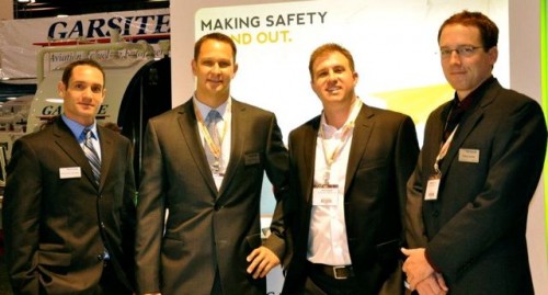 Stratos Jets private flight advisors pose at the NBAA Convention in October 2011