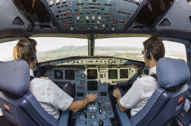 jet charter pilots in cockpit