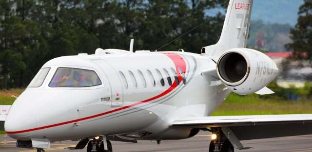 Lear 75 Private Jet On Runway | Stratos Jets Charters, Inc.