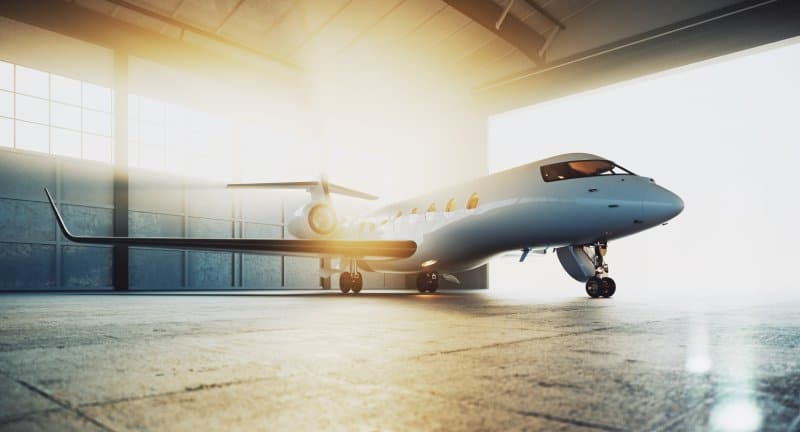 A private jet sitting in a hangar.